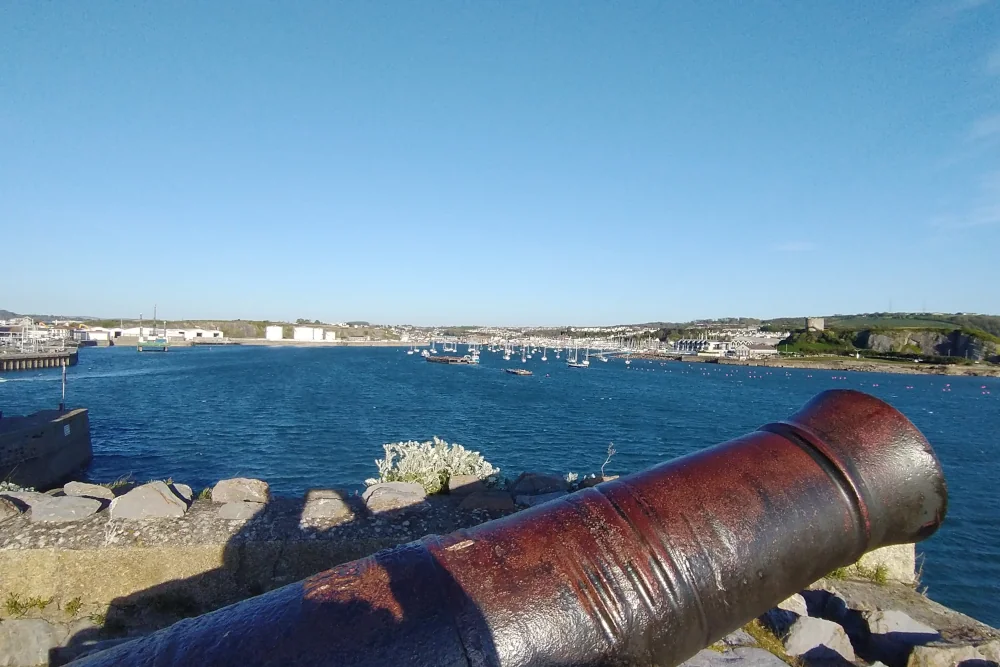 Approaching the Barbican from Plymouth Citadel with views towards the harbour entrance on a circular walk